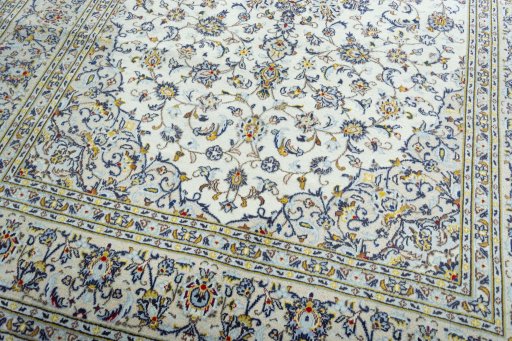 Close-up detail of 2000s Kashan rug from Iran / Persia showing Wool weave