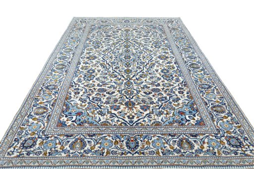 Surface texture of 2000s Kashan rug with natural Wool and intricate pattern
