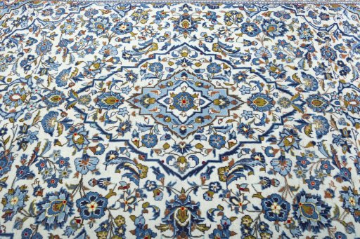Central medallion detail of 2000s Kashan rug from Iran / Persia