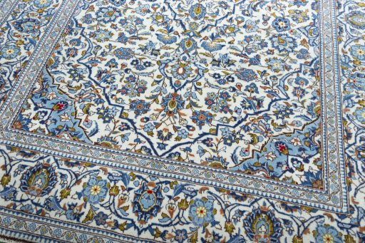 Close-up detail of 2000s Kashan rug from Iran / Persia showing Wool weave