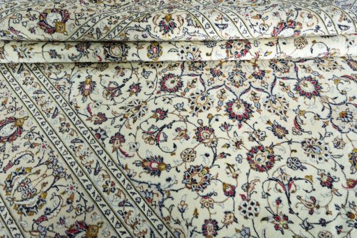 Close-up detail of 2000s Kashan rug from Iran / Persia showing Wool weave