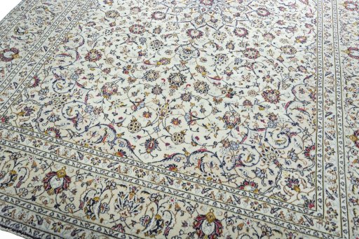Close-up detail of 2000s Kashan rug from Iran / Persia showing Wool weave