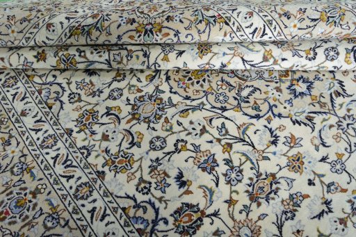 Close-up detail of New Kashan rug from Iran / Persia showing Wool weave