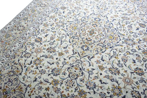 Backside of handmade New Kashan rug showing knot structure and weave density