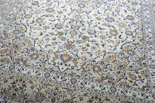 Close-up detail of New Kashan rug from Iran / Persia showing Wool weave