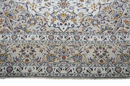 Full view of New Kashan rug from Iran / Persia, 337 × 250 cm in Beige tones