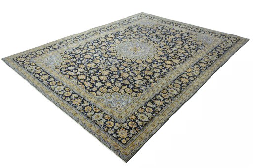 Corner detail of 2000s Kashan rug showing border pattern and Wool pile