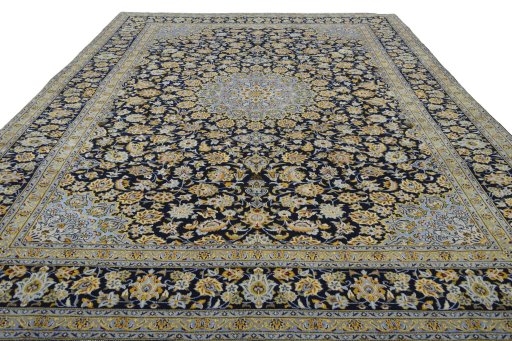 Surface texture of 2000s Kashan rug with natural Wool and intricate pattern