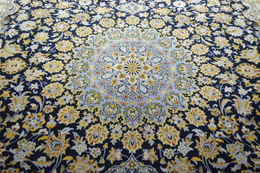 Central medallion detail of 2000s Kashan rug from Iran / Persia