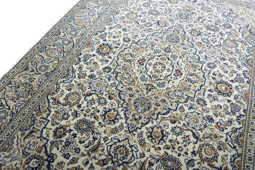 Backside of handmade New Kashan rug showing knot structure and weave density