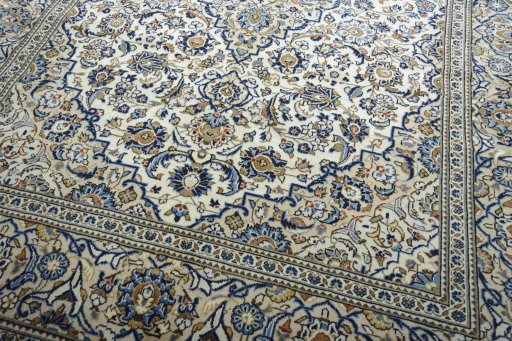 Close-up detail of New Kashan rug from Iran / Persia showing Wool weave