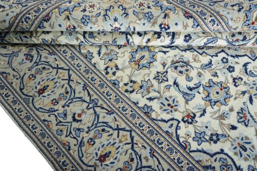 Close-up detail of 2000s Kashan rug from Iran / Persia showing Wool weave