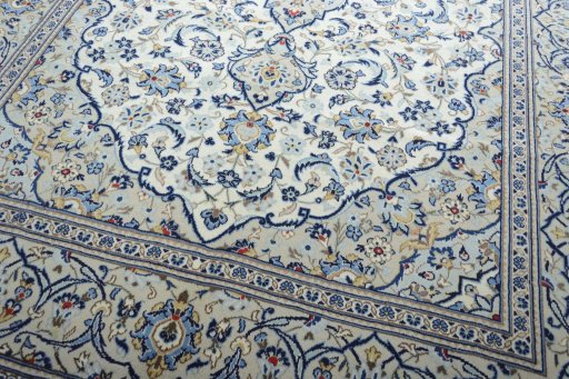 Close-up detail of 2000s Kashan rug from Iran / Persia showing Wool weave