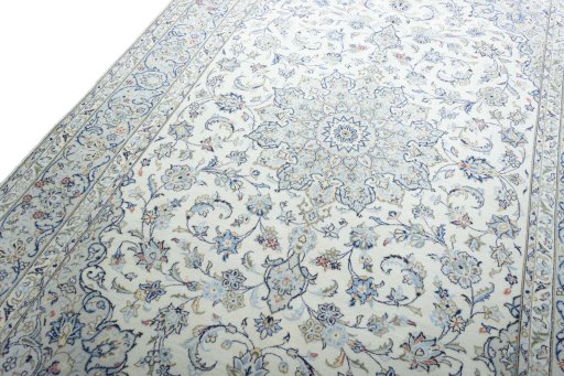 Backside of handmade New Kashan rug showing knot structure and weave density