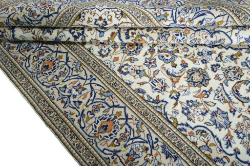 Close-up detail of 2000s Kashan rug from Iran / Persia showing Wool weave