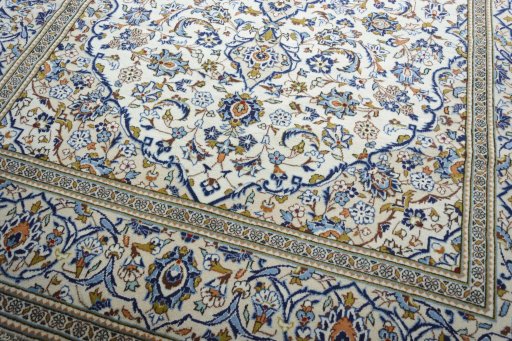 Close-up detail of 2000s Kashan rug from Iran / Persia showing Wool weave