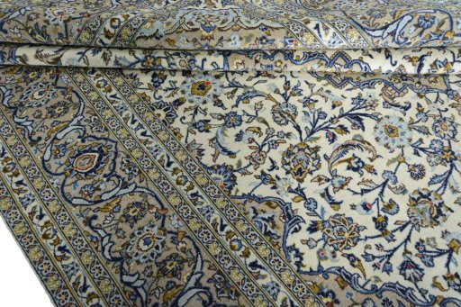 Close-up detail of 2000s Kashan rug from Iran / Persia showing Wool weave