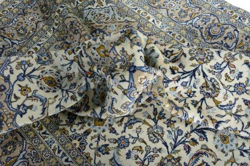 Surface texture of 2000s Kashan rug with natural Wool and intricate pattern