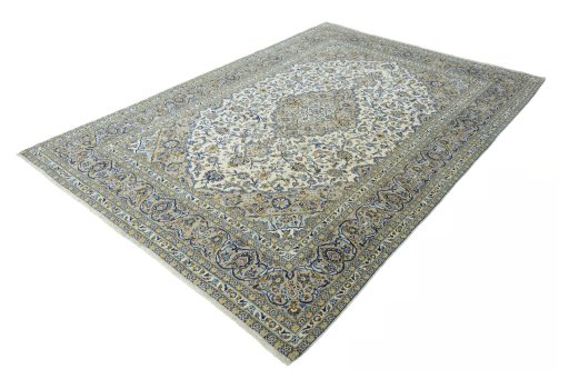 Corner detail of 2000s Kashan rug showing border pattern and Wool pile