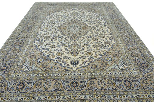 Surface texture of 2000s Kashan rug with natural Wool and intricate pattern
