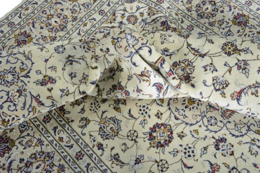 Surface texture of New Kashan rug with natural Wool and intricate pattern