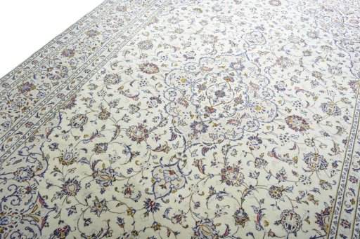 Backside of handmade New Kashan rug showing knot structure and weave density