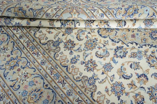 Close-up detail of New Kashan rug from Iran / Persia showing Wool weave