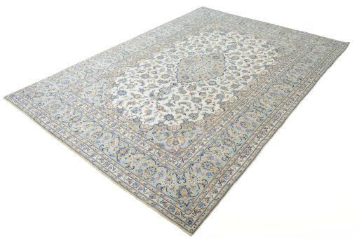 Corner detail of New Kashan rug showing border pattern and Wool pile