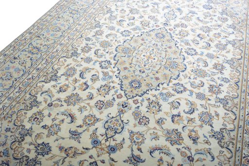 Backside of handmade New Kashan rug showing knot structure and weave density
