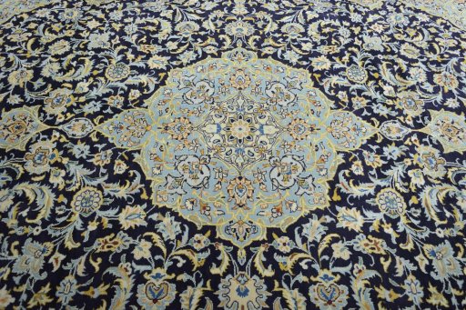 Central medallion detail of 2000s Kashan rug from Iran / Persia