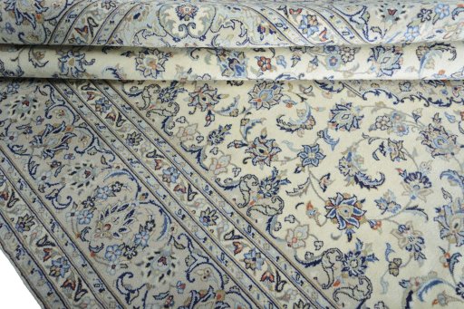 Close-up detail of New Kashan rug from Iran / Persia showing Wool weave