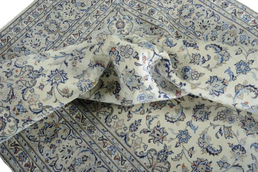 Surface texture of New Kashan rug with natural Wool and intricate pattern