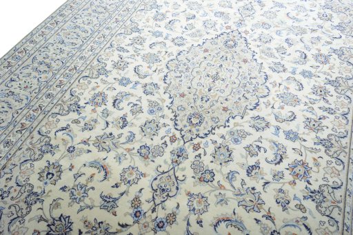 Backside of handmade New Kashan rug showing knot structure and weave density