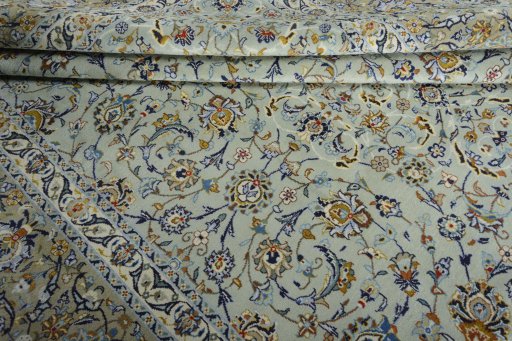 Close-up detail of 2000s Kashan rug from Iran / Persia showing Wool weave