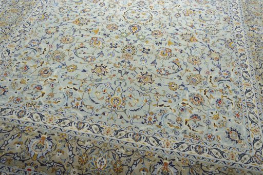 Close-up detail of 2000s Kashan rug from Iran / Persia showing Wool weave