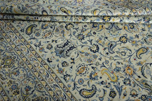 Close-up detail of 2000s Kashan rug from Iran / Persia showing Wool weave