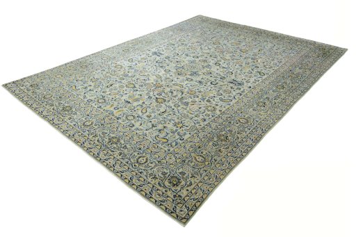 Corner detail of 2000s Kashan rug showing border pattern and Wool pile