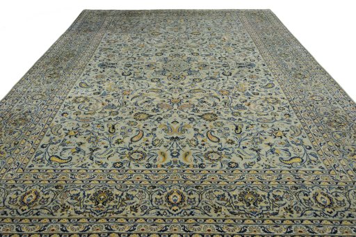 Surface texture of 2000s Kashan rug with natural Wool and intricate pattern