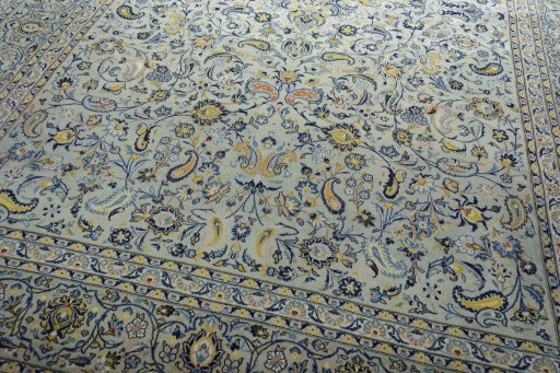 Close-up detail of 2000s Kashan rug from Iran / Persia showing Wool weave