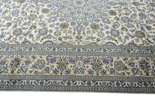 Corner detail of New Kashan rug showing border pattern and Wool pile