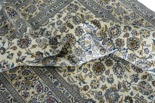 Surface texture of New Kashan rug with natural Wool and intricate pattern