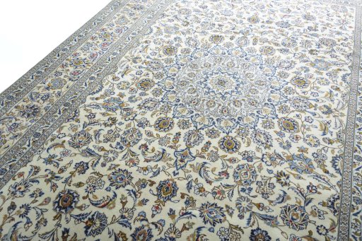 Backside of handmade New Kashan rug showing knot structure and weave density