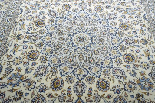 Central medallion detail of New Kashan rug from Iran / Persia