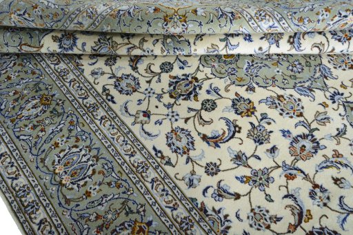 Close-up detail of 2000s Kashan rug from Iran / Persia showing Wool weave