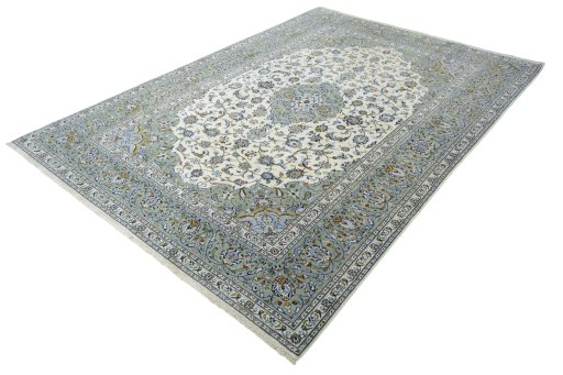 Corner detail of 2000s Kashan rug showing border pattern and Wool pile