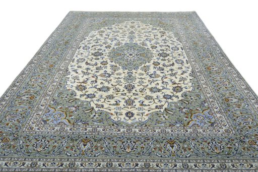 Surface texture of 2000s Kashan rug with natural Wool and intricate pattern