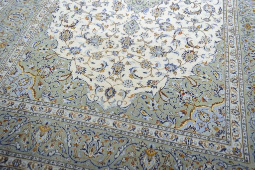 Close-up detail of 2000s Kashan rug from Iran / Persia showing Wool weave