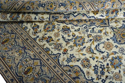 Close-up detail of 2000s Kashan rug from Iran / Persia showing Wool weave
