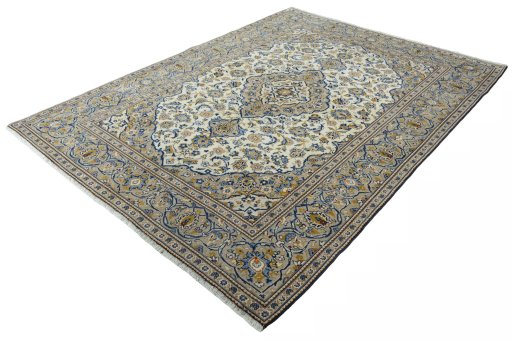 Corner detail of 2000s Kashan rug showing border pattern and Wool pile