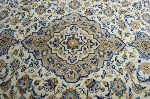 Central medallion detail of 2000s Kashan rug from Iran / Persia